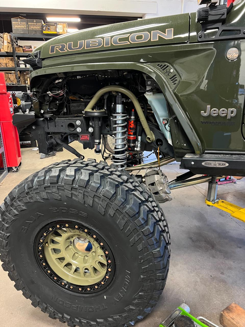 On the lift — Outlaw Jeep and Truck