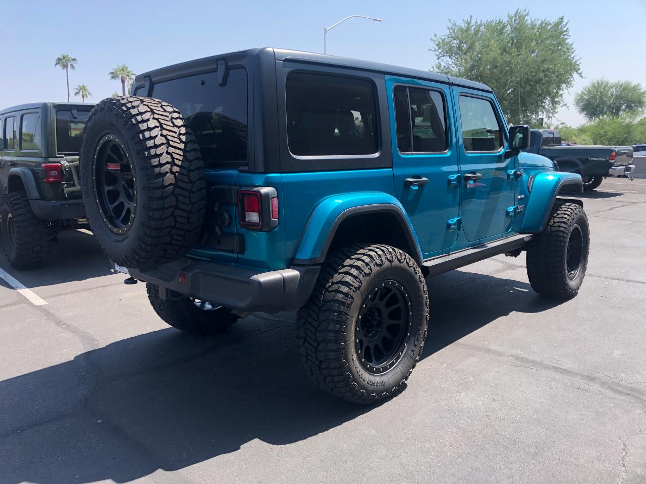 On the lift — Outlaw Jeep and Truck